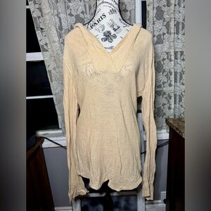Loose knit long sleeve hoodie.